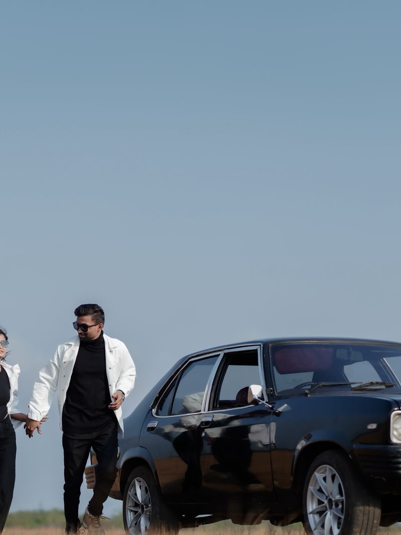 Couple walking beside the Contessa